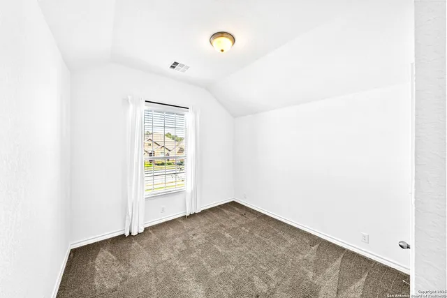 a bathroom with a sink double vanity granite tub and shower