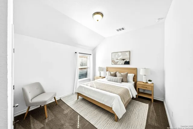 a view of backyard with tree