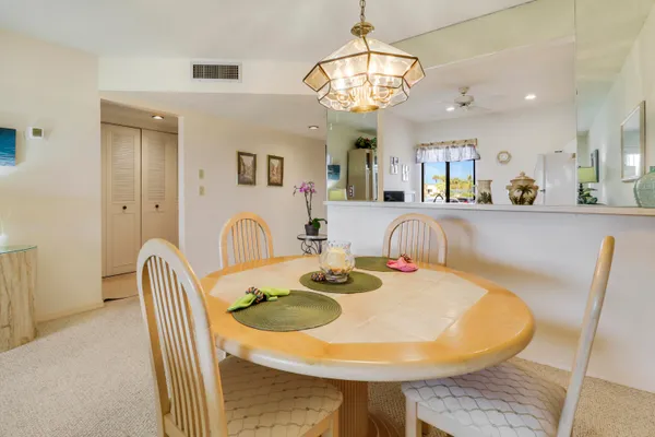 a view of a dining room with furniture