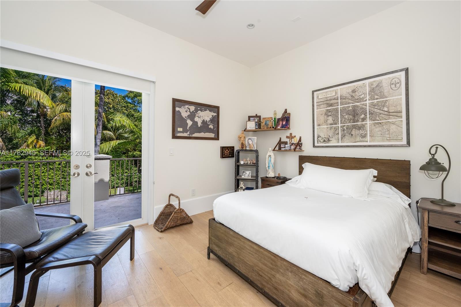 31 Island Drive Key Biscayne, FL 33149 - Photo 16 of 26 a bedroom with a bed and a large window