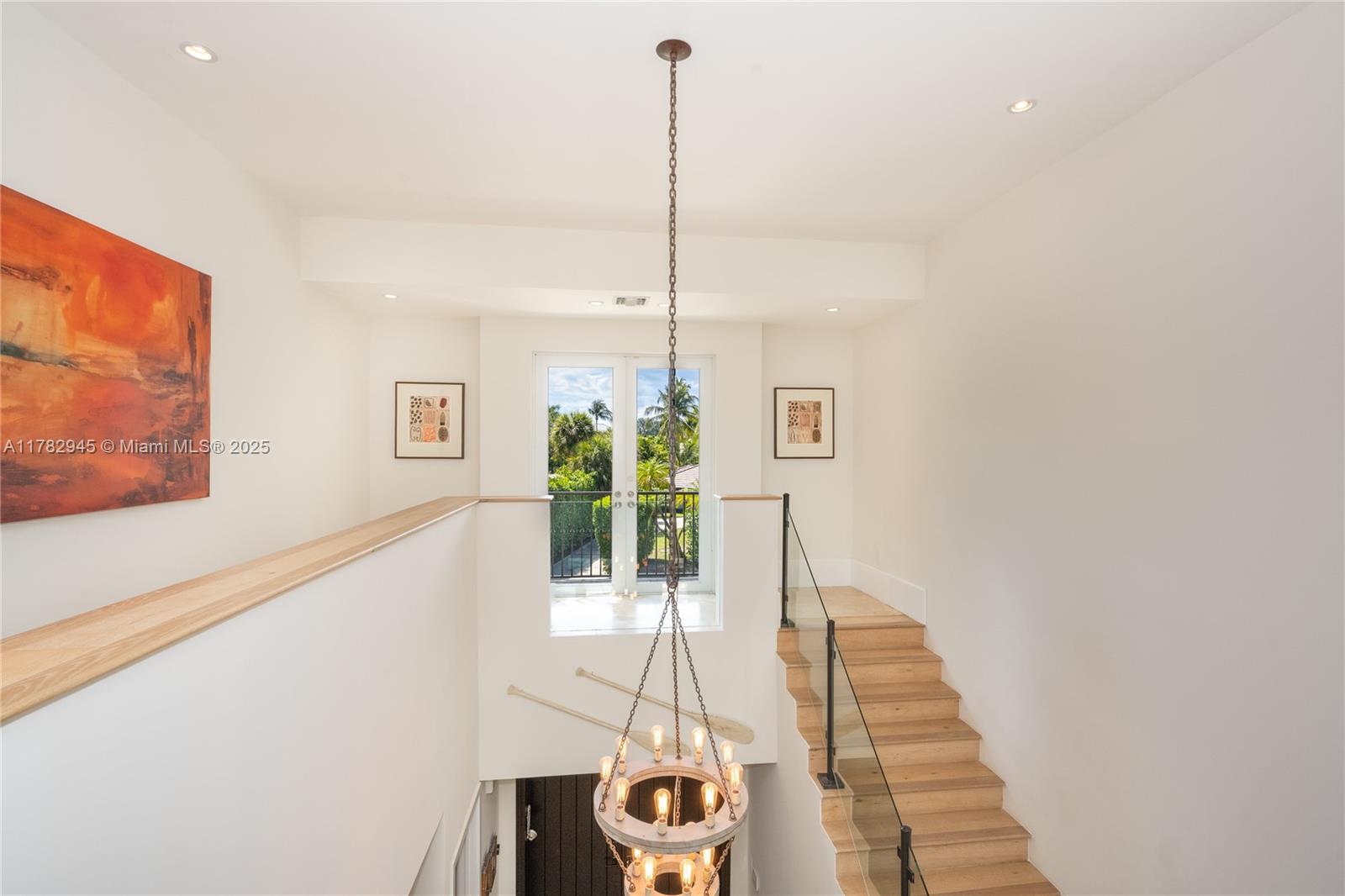 31 Island Drive Key Biscayne, FL 33149 - Photo 18 of 26 a living room with furniture and a potted plant