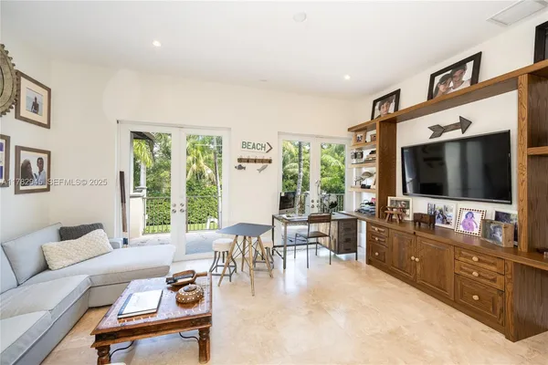 a living room with furniture and a table