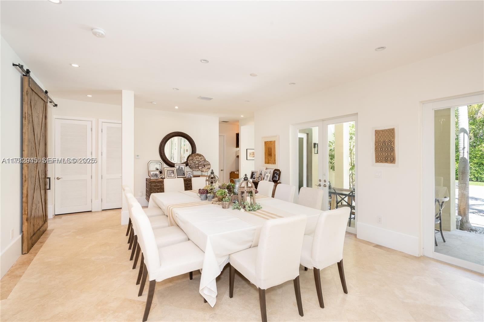 31 Island Drive Key Biscayne, FL 33149 - Photo 9 of 26 a dining room with furniture and window