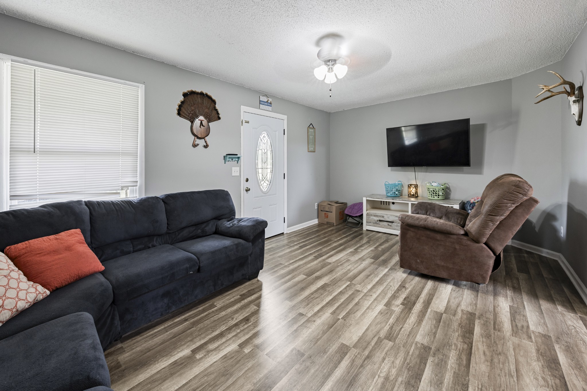 421 Shady Grove Road Flintville, TN 37335 - Photo 17 of 33 a living room with furniture and a flat screen tv