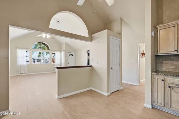 a view of cabinets with wooden floor