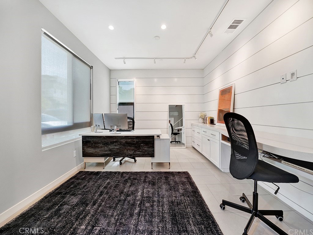 604 Malibu Costa Mesa, CA 92627 - Photo 2 of 40 a bedroom with furniture and a window