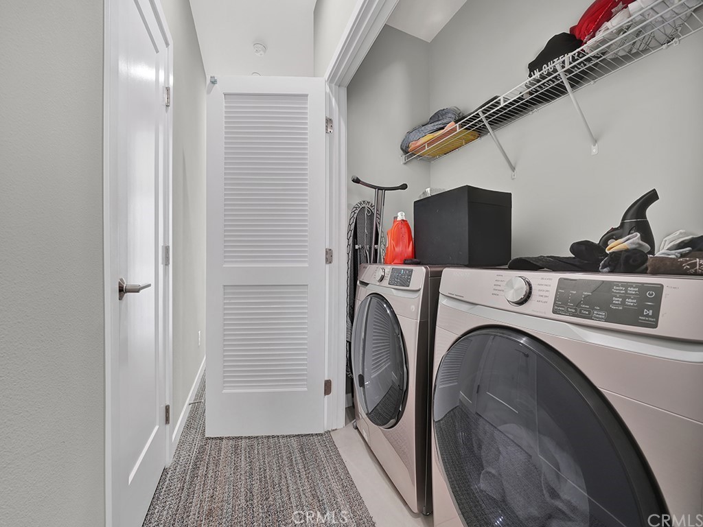 604 Malibu Costa Mesa, CA 92627 - Photo 28 of 40 a utility room with dryer and washer