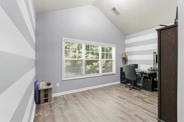 a room with a window and a table