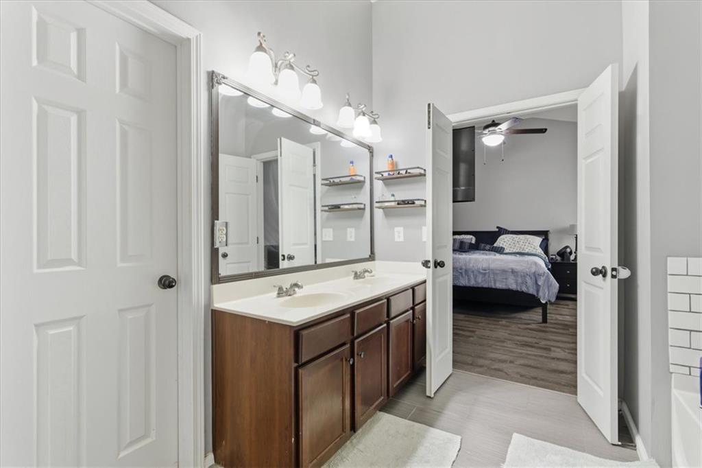 4349 Kousa Road, Unit 4 Austell, GA 30106 - Photo 17 of 43 a en suite bathroom with a double vanity sink and mirror