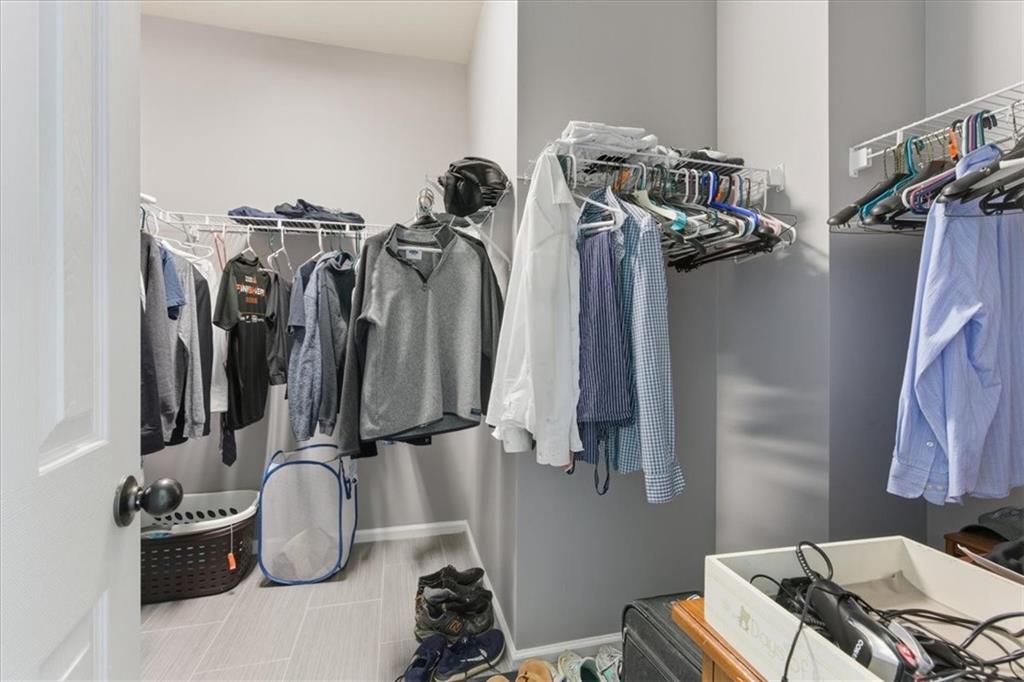 4349 Kousa Road, Unit 4 Austell, GA 30106 - Photo 20 of 43 a view of walk in closet with clothes