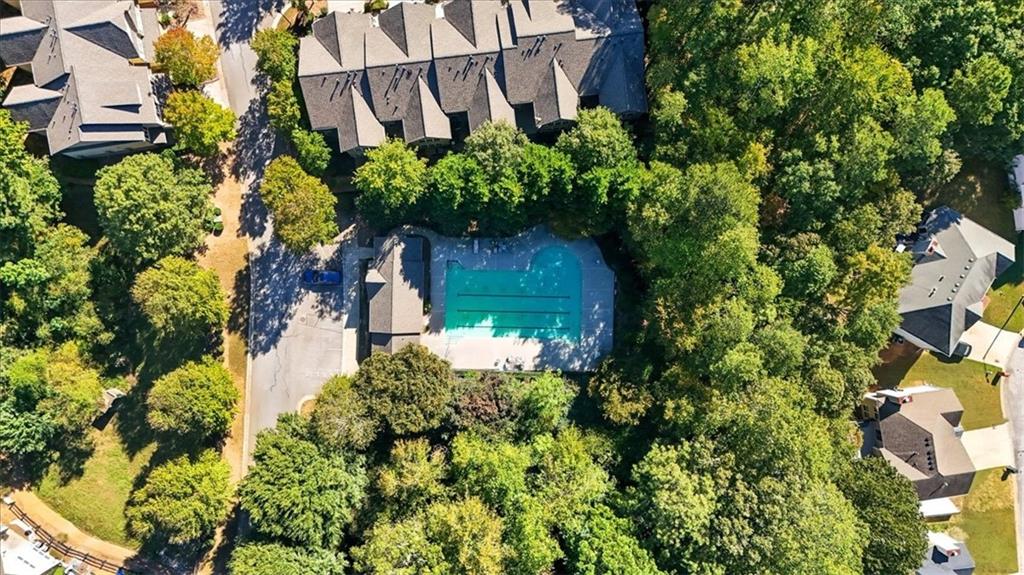 4349 Kousa Road, Unit 4 Austell, GA 30106 - Photo 31 of 43 front view of a house with a small yard and potted plants