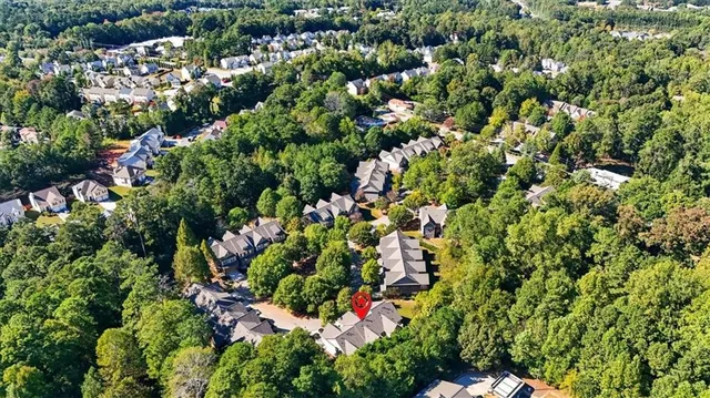 a view of a yard and trees