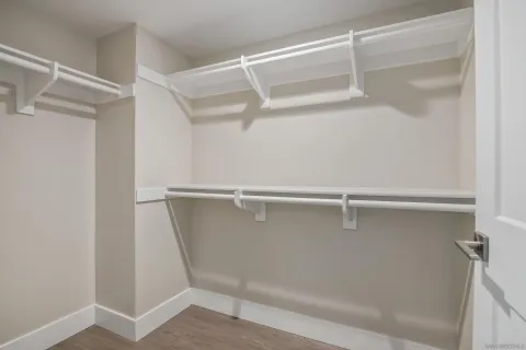 a view of an empty walk in closet