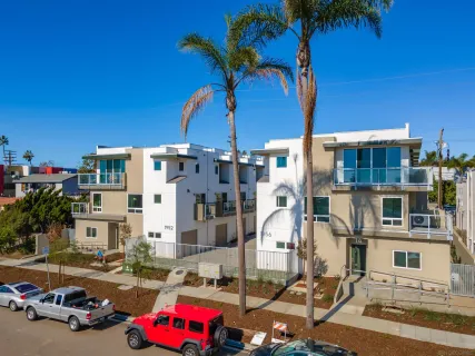 a cars parked in front of a building