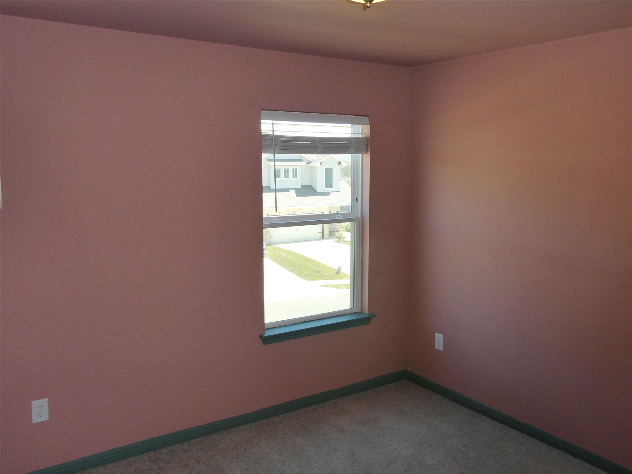 10906 Sentinel Drive Austin, TX 78747 - Photo 14 of 18 an empty room with a window