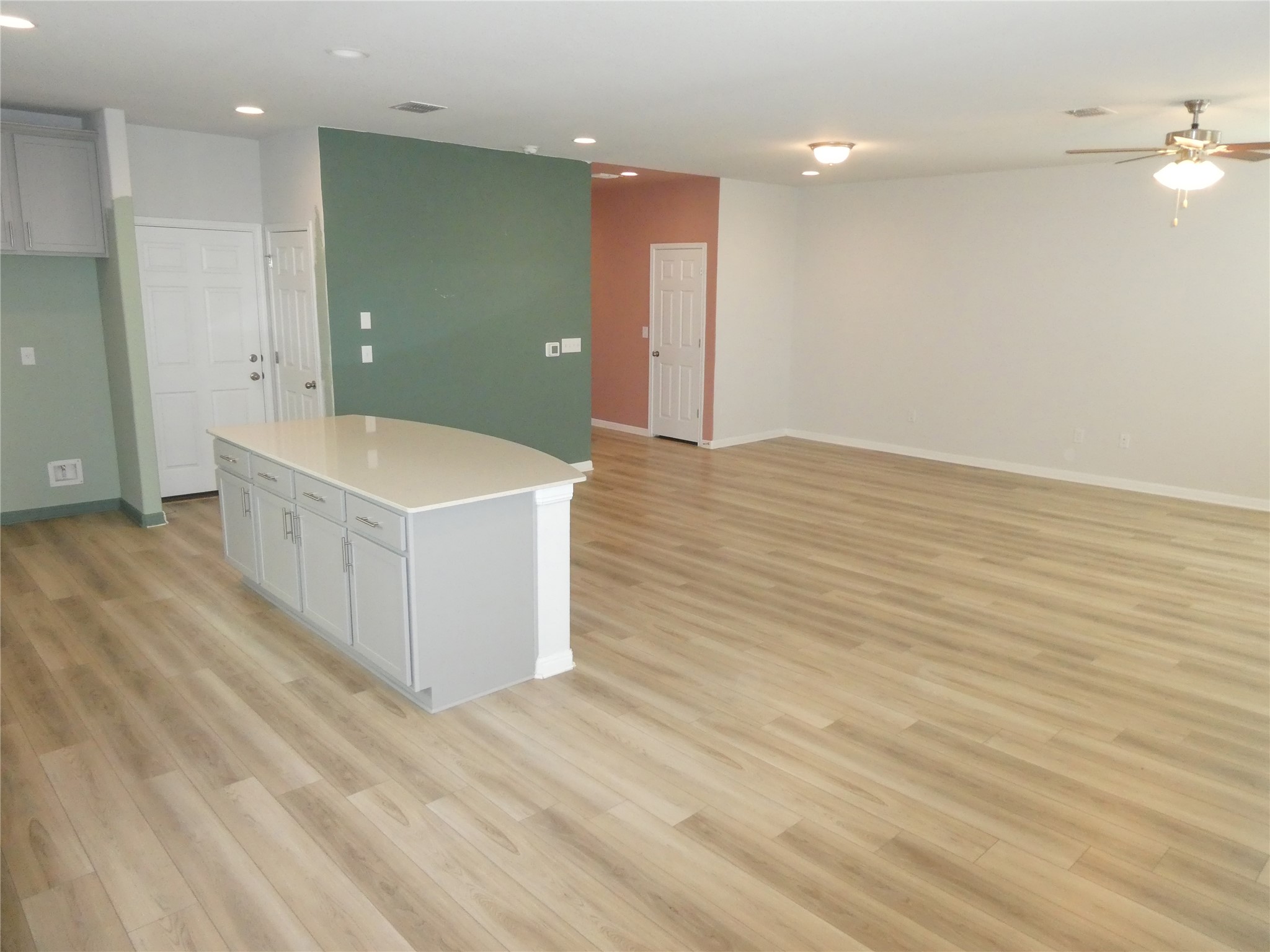 10906 Sentinel Drive Austin, TX 78747 - Photo 6 of 18 a view of a room with wooden floor