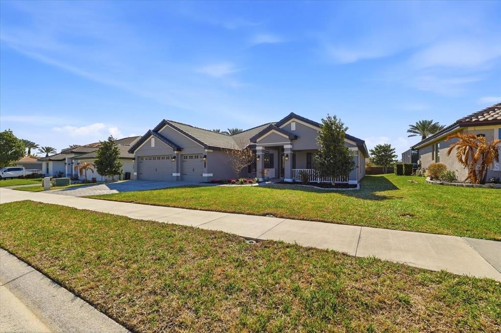 331 Cres Ridge Road Auburndale, FL 33823 - Photo 2 of 63 a view of a house with a big yard