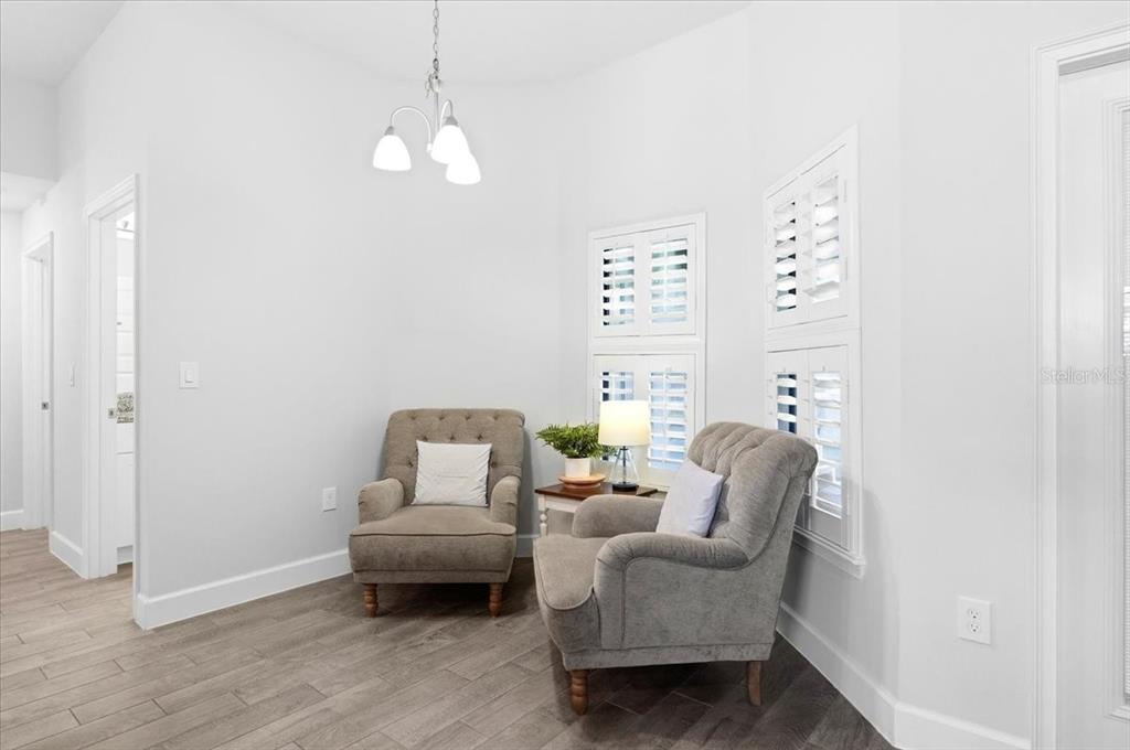 331 Cres Ridge Road Auburndale, FL 33823 - Photo 21 of 63 a living room with furniture and a window