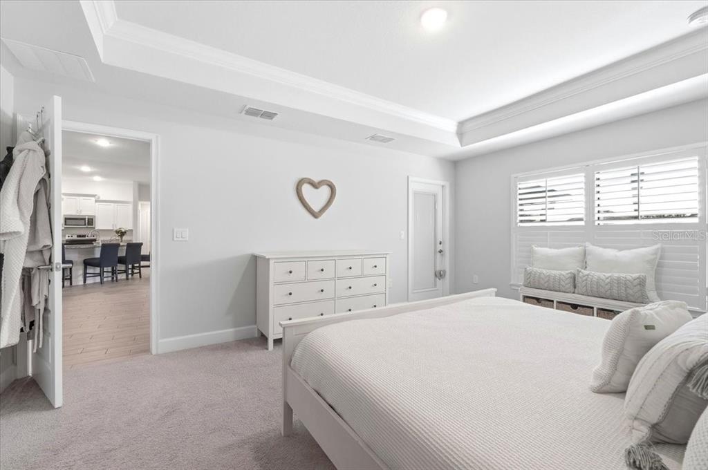 331 Cres Ridge Road Auburndale, FL 33823 - Photo 36 of 63 a bedroom with a bed and a large window