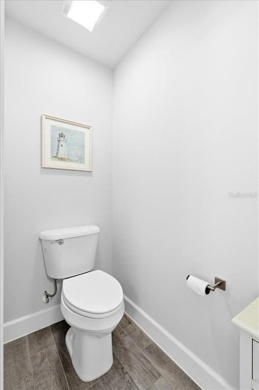 331 Cres Ridge Road Auburndale, FL 33823 - Photo 45 of 63 a white toilet sitting next to a white sink