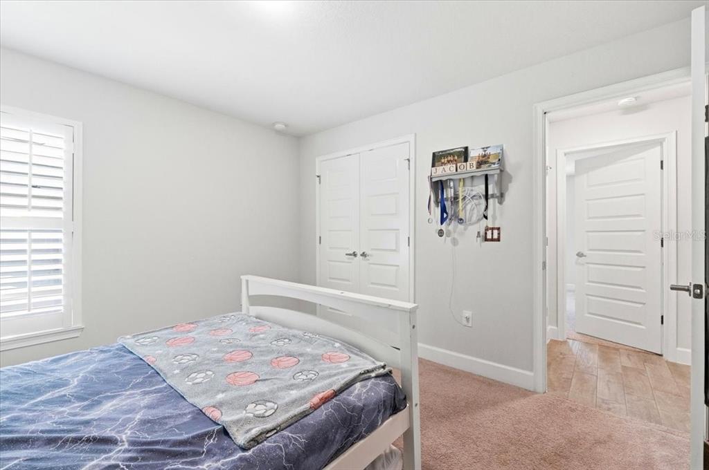 331 Cres Ridge Road Auburndale, FL 33823 - Photo 48 of 63 a bedroom with a bed and a window