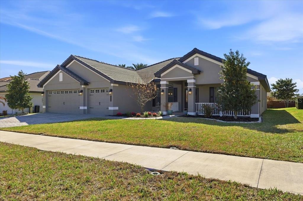 331 Cres Ridge Road Auburndale, FL 33823 - Photo 7 of 63 a front view of a house with a yard