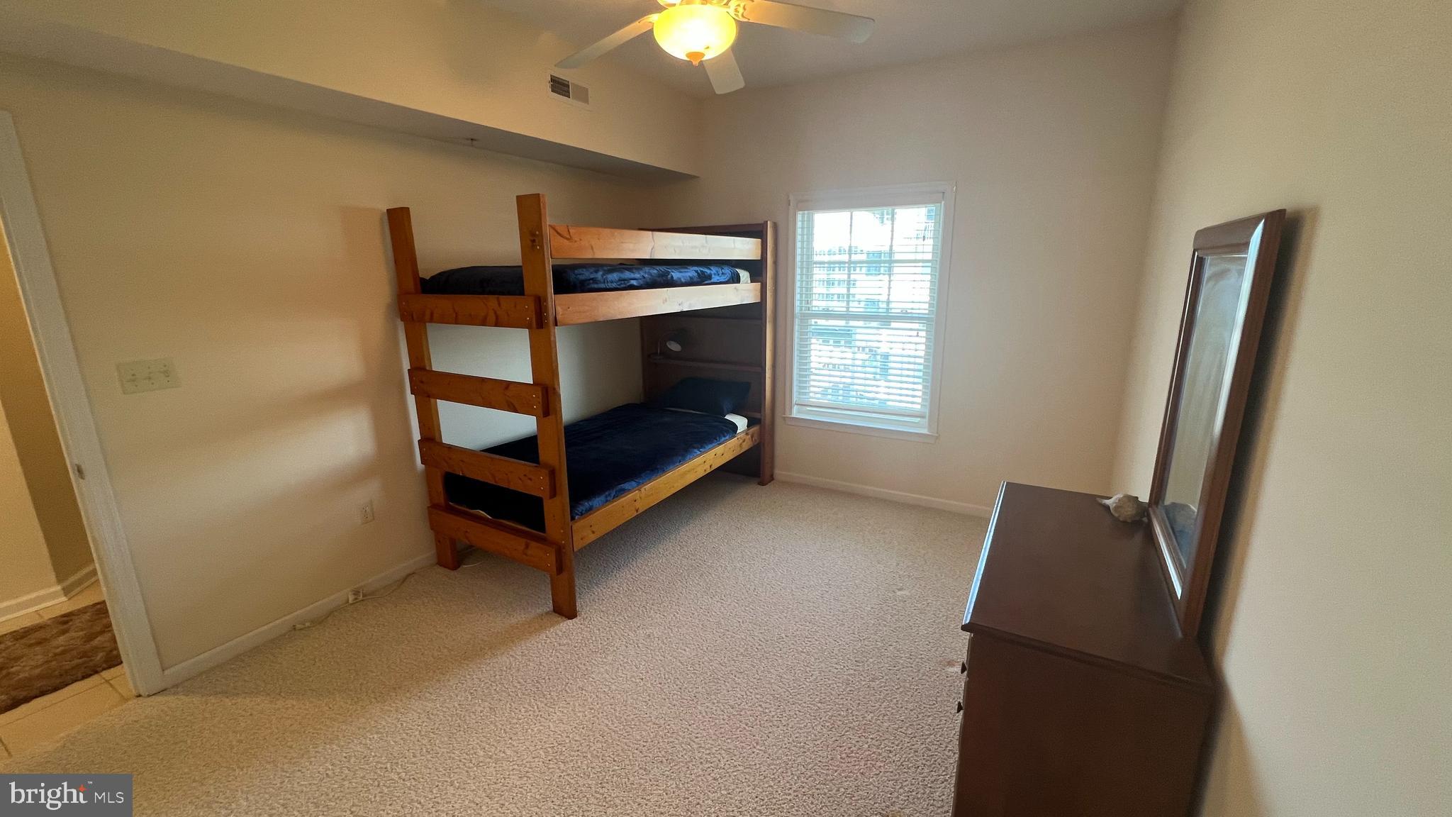 103 Williams Street, Unit 416 Crisfield, MD 21817 - Photo 26 of 38 a bedroom with bunk bed