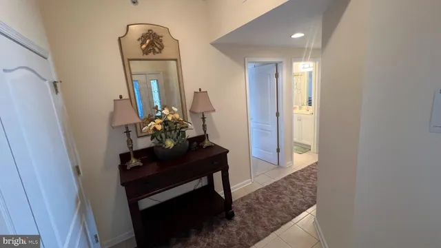 a view of a hallway with a livingroom