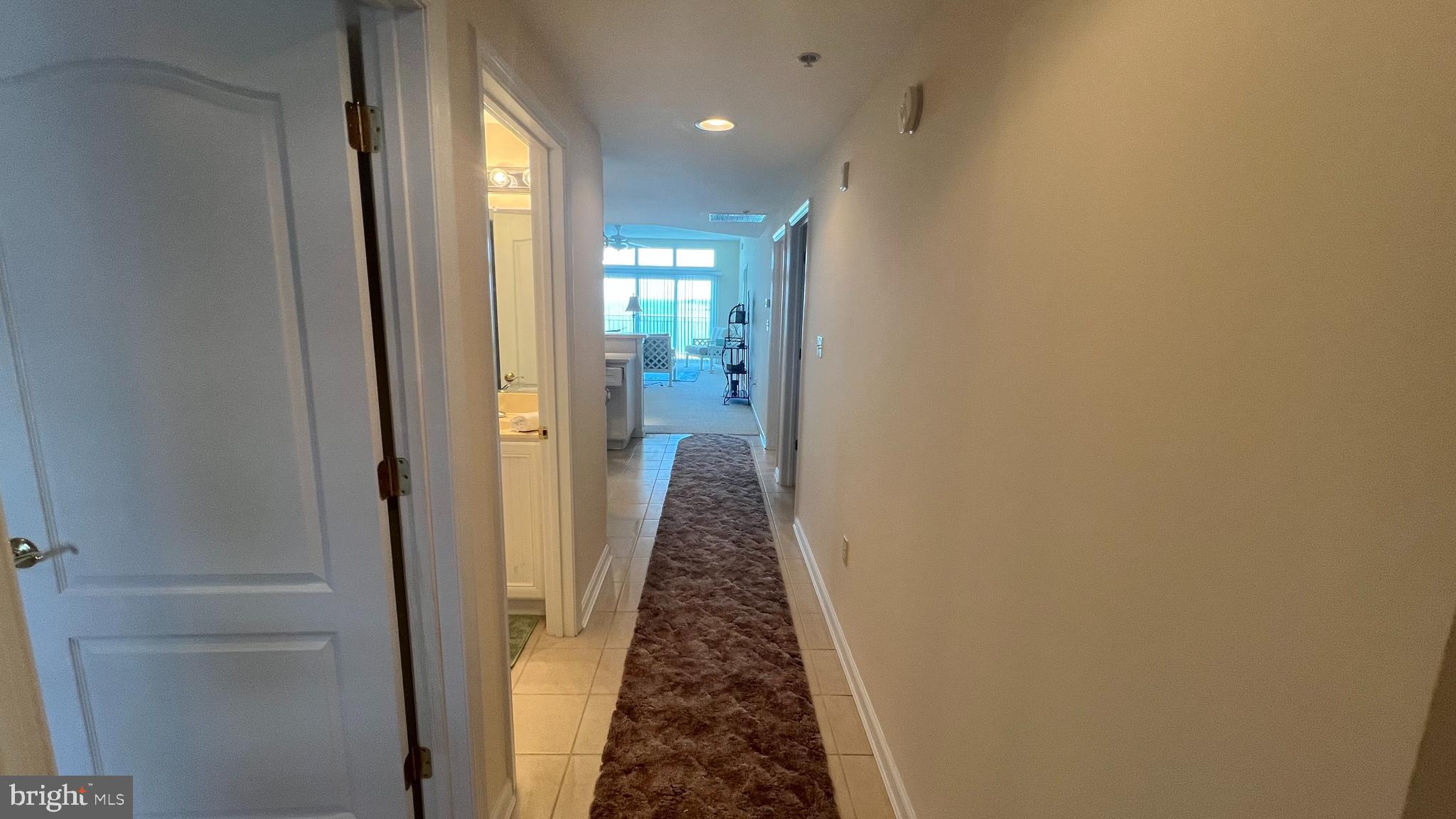 103 Williams Street, Unit 416 Crisfield, MD 21817 - Photo 35 of 38 a view of a hallway with a livingroom