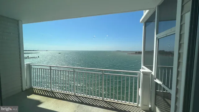 a view of a lake from a balcony