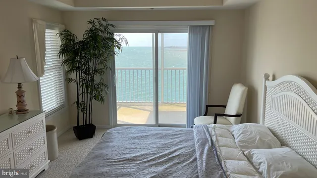 a bed room with a bed and a window