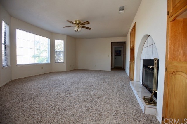 520 Lupine Lane Templeton, CA 93465 - Photo 12 of 25 Family room with double sided fire place and stunning views.