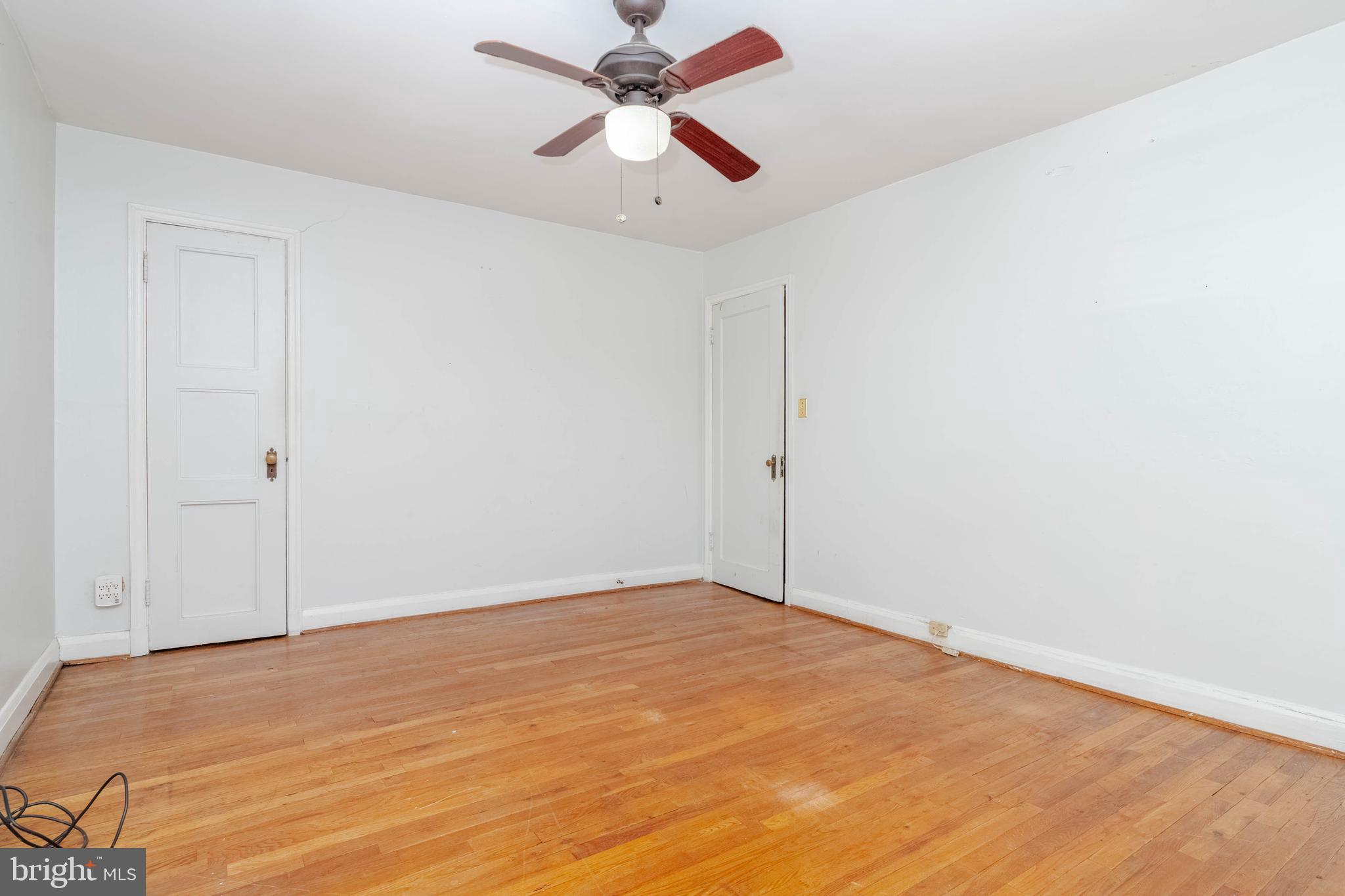 1517 North Potomac Street Baltimore, MD 21213 - Photo 19 of 44 a view of empty room with ceiling fan