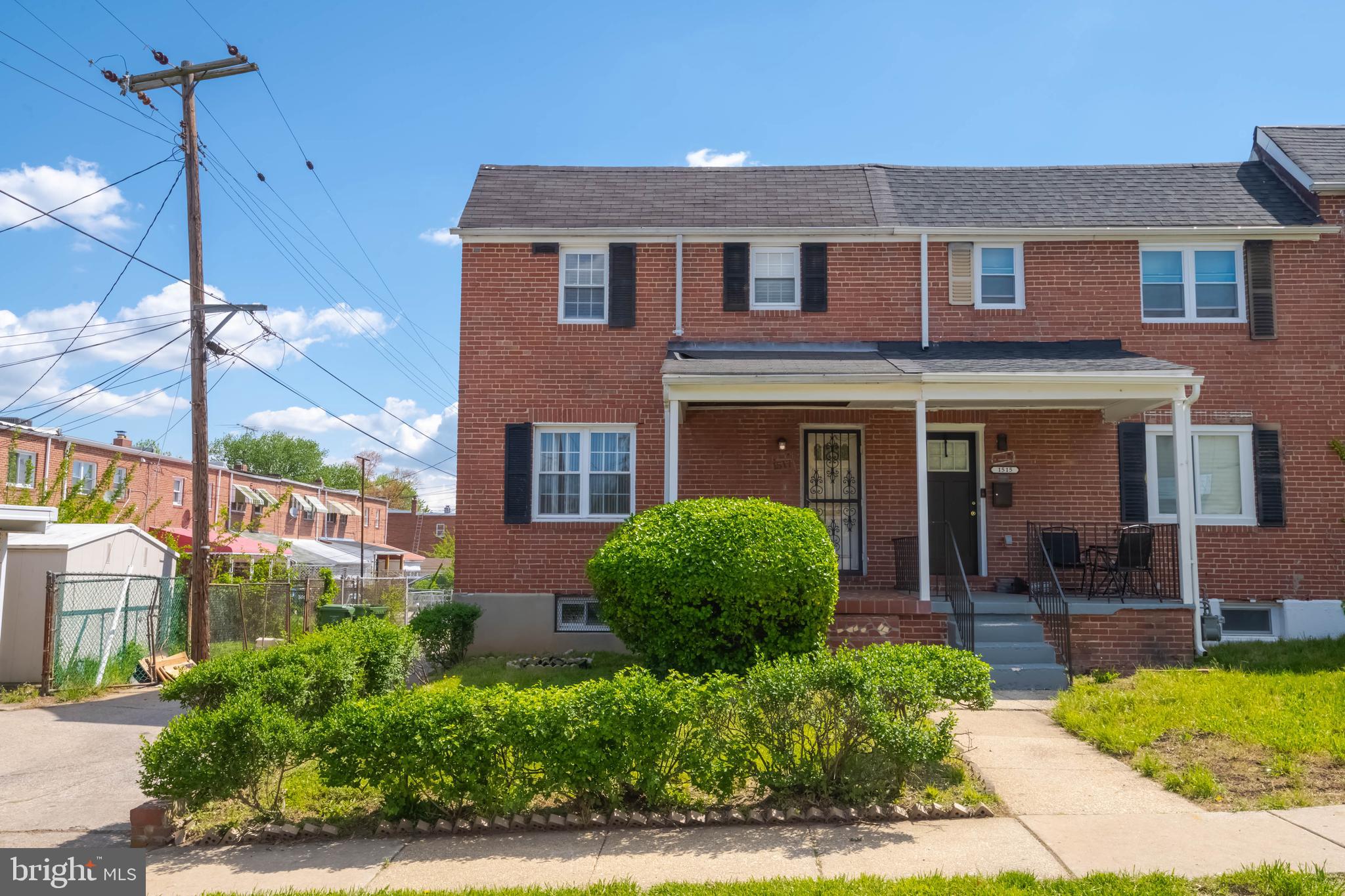 1517 North Potomac Street Baltimore, MD 21213 - Photo 2 of 44 a front view of a house with garden and plants