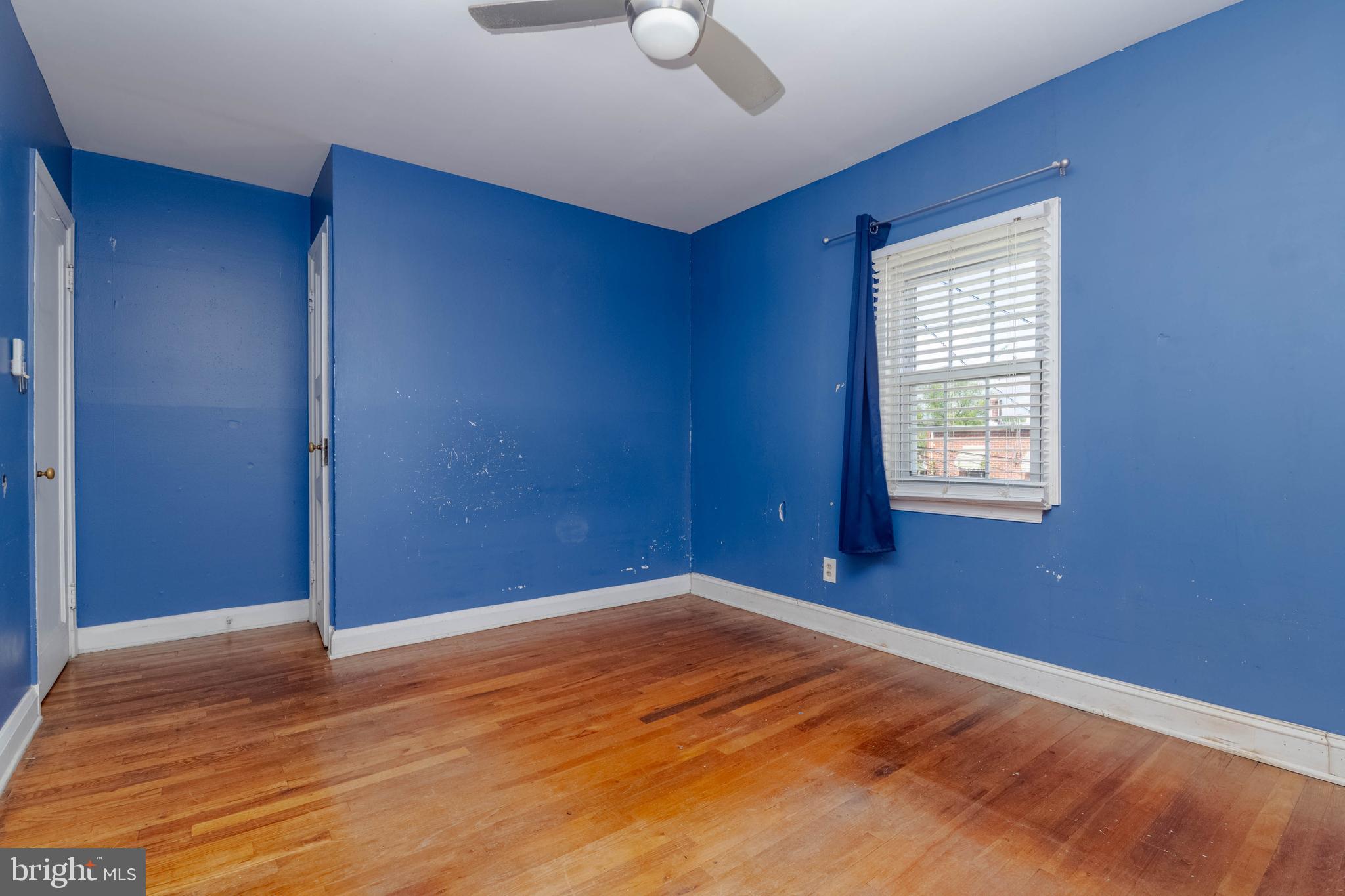 1517 North Potomac Street Baltimore, MD 21213 - Photo 21 of 44 a view of empty room with wooden floor