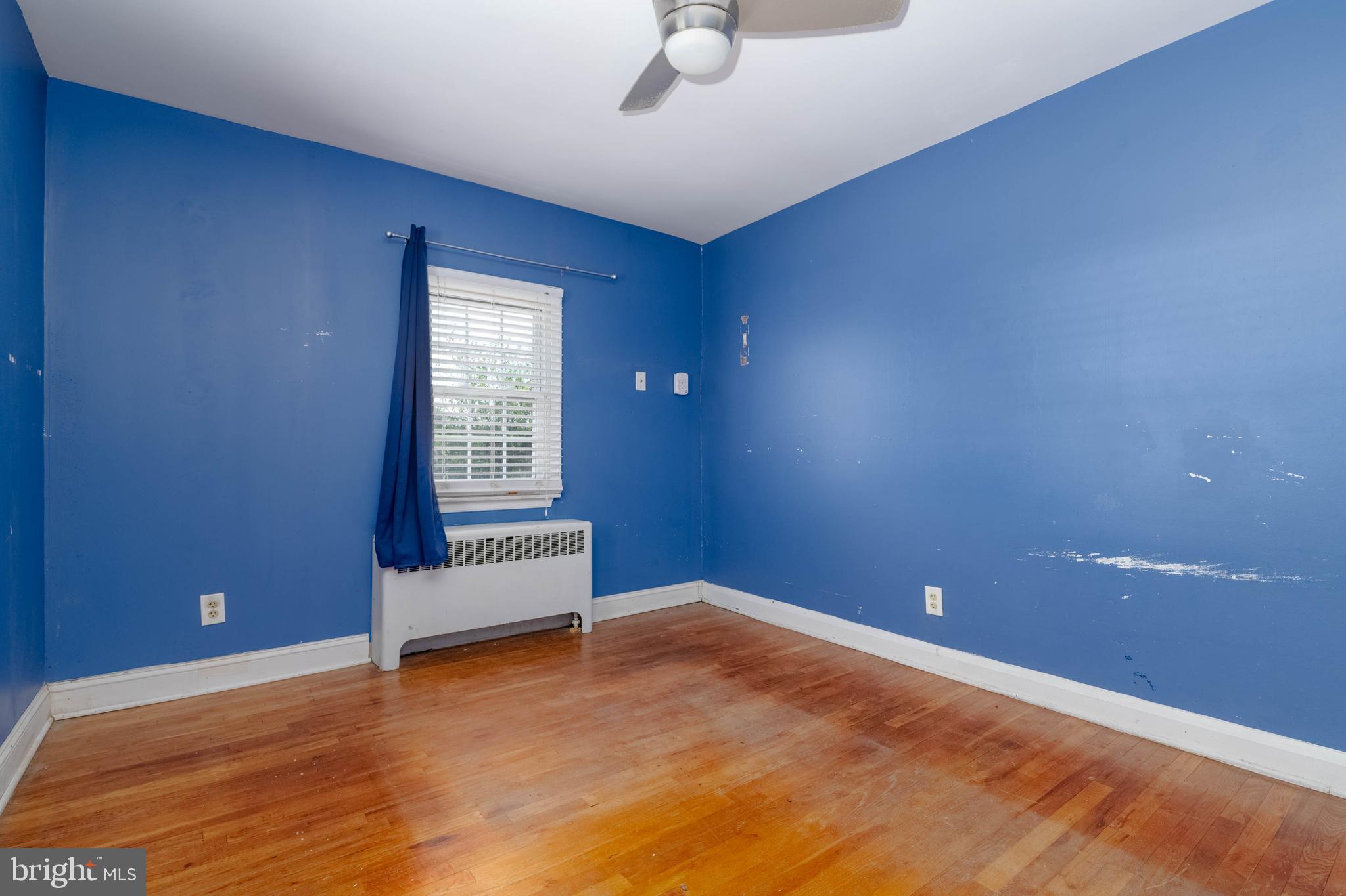 1517 North Potomac Street Baltimore, MD 21213 - Photo 23 of 44 a view of an empty room with a window