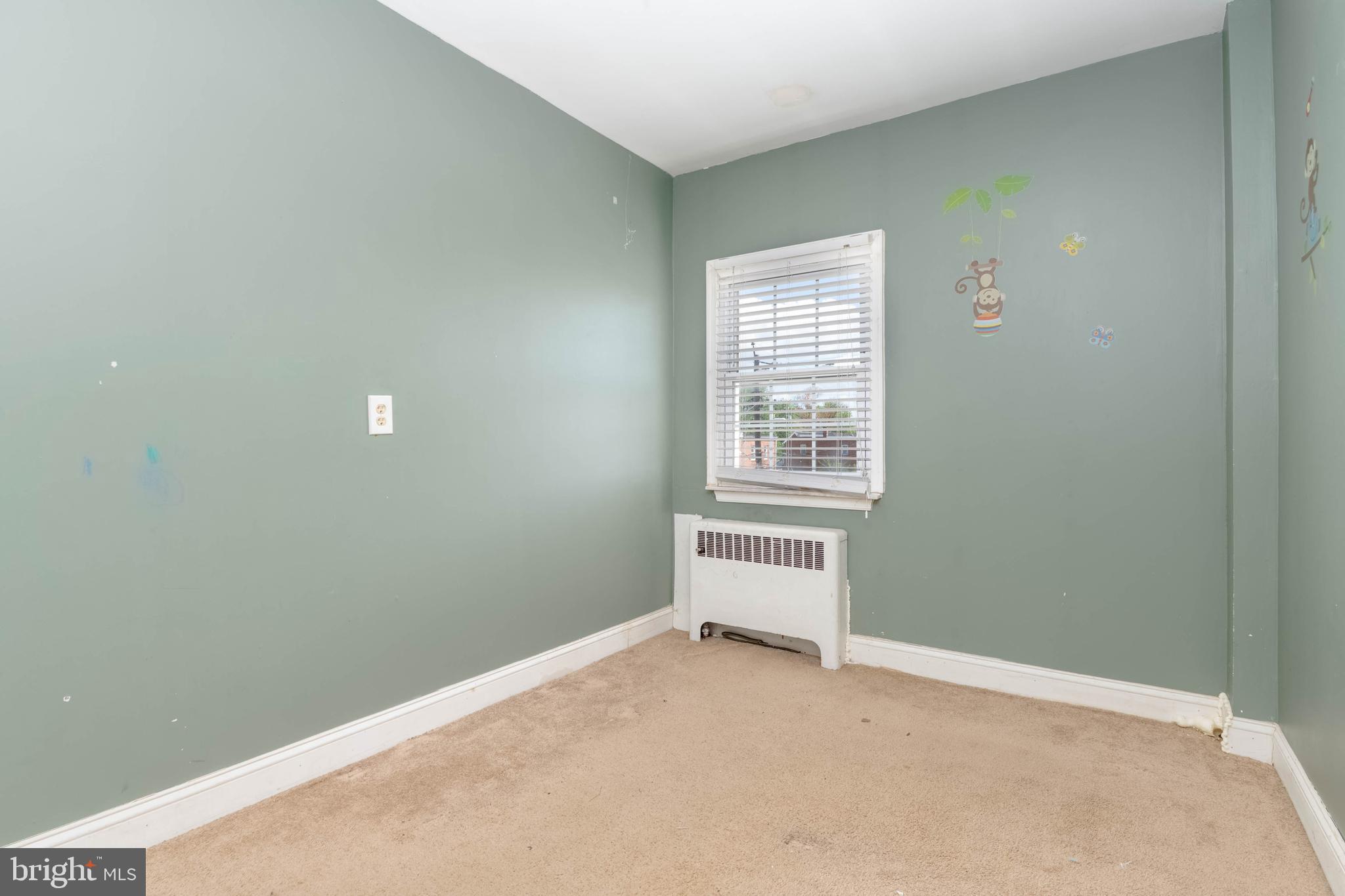 1517 North Potomac Street Baltimore, MD 21213 - Photo 27 of 44 an empty room with windows