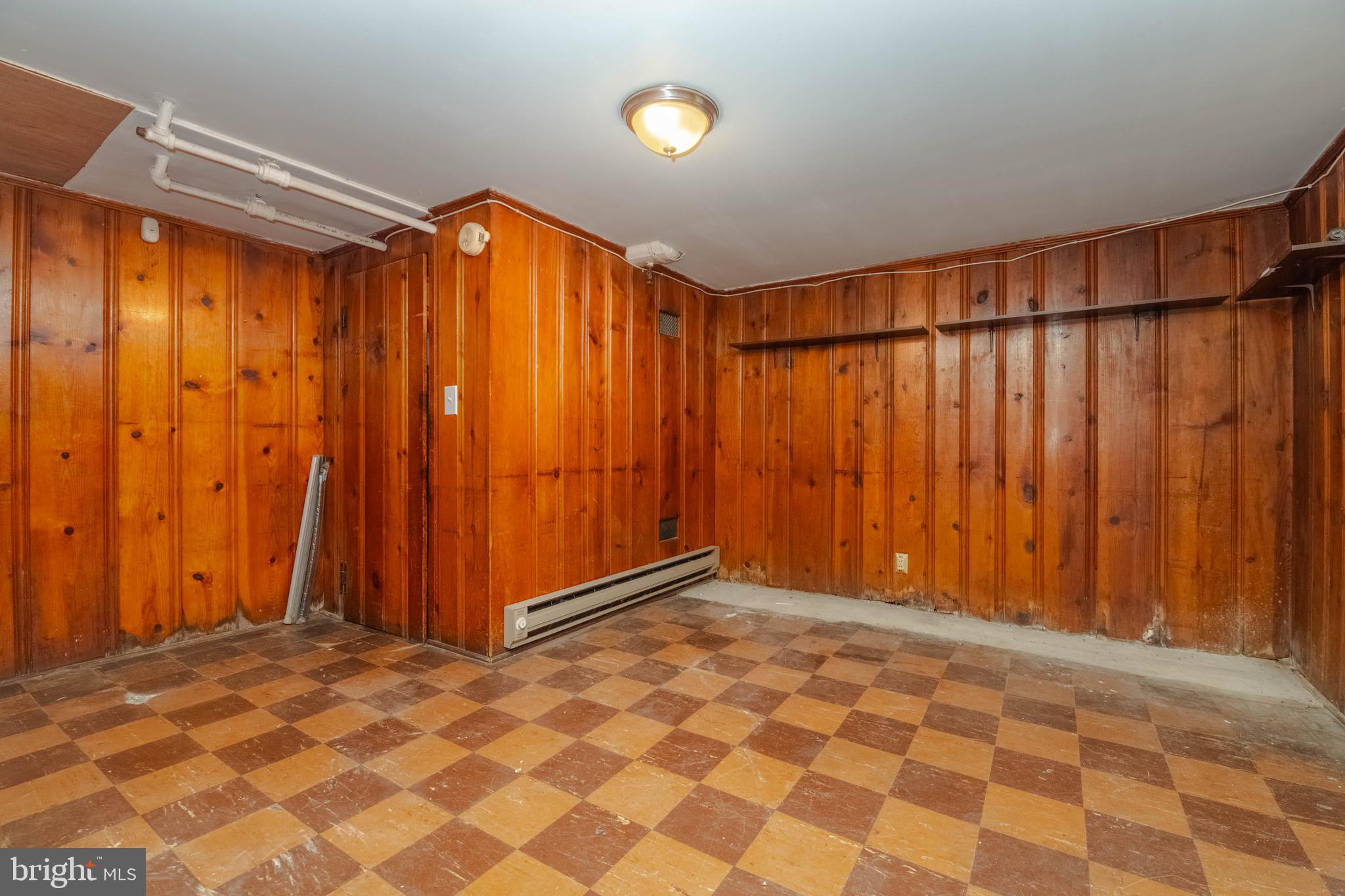 1517 North Potomac Street Baltimore, MD 21213 - Photo 34 of 44 a view of a room with a wooden door