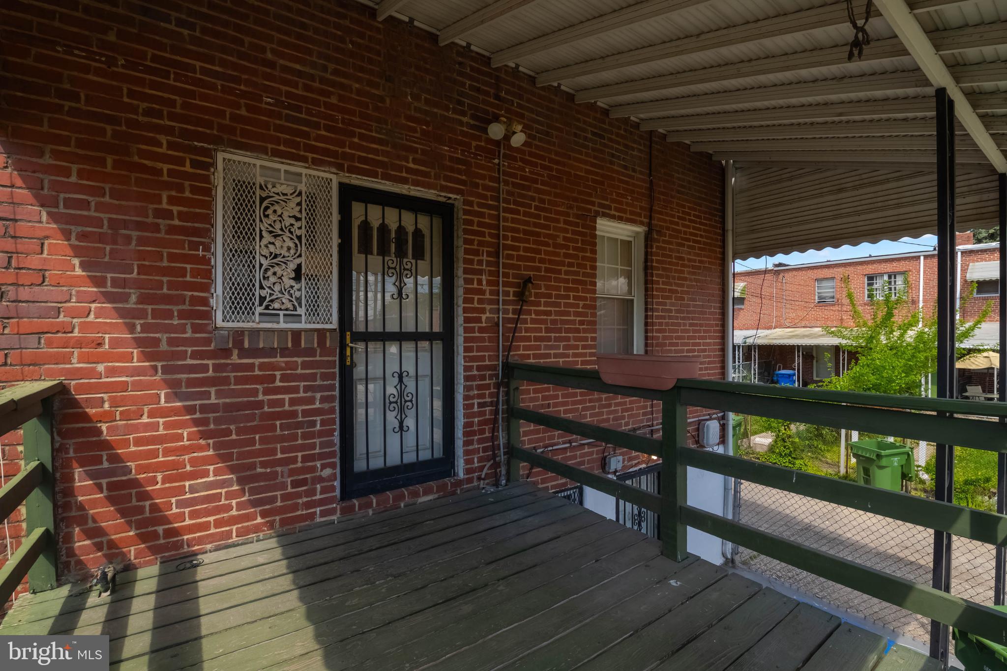 1517 North Potomac Street Baltimore, MD 21213 - Photo 43 of 44 a view of a brick wall with a large window
