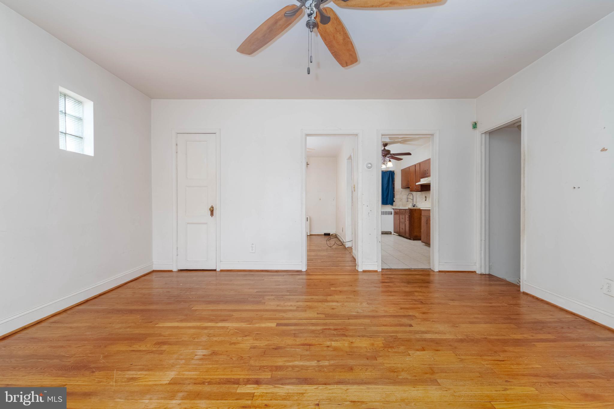 1517 North Potomac Street Baltimore, MD 21213 - Photo 8 of 44 a view of empty room with wooden floor
