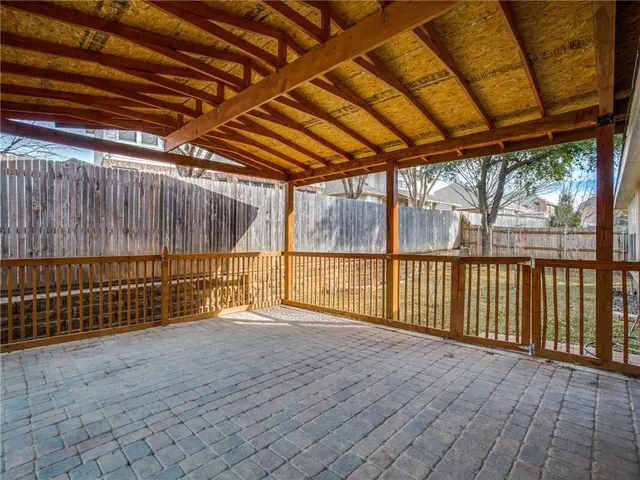 a view of porch with a wooden deck
