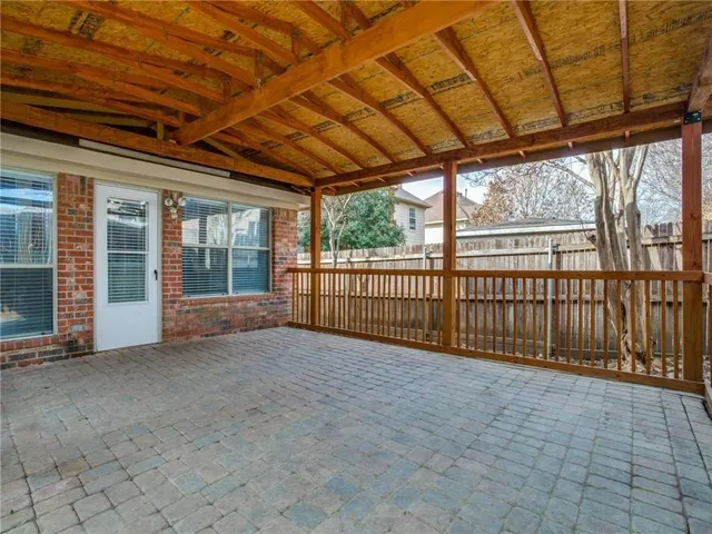 a view of a room with wooden walls