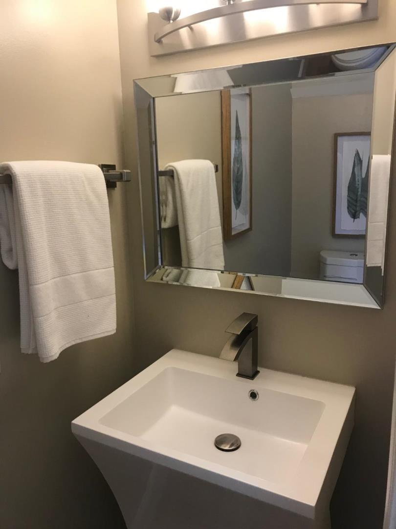 131 Giffin Road Los Altos, CA 94022 - Photo 12 of 29 a bathroom with a sink and a mirror