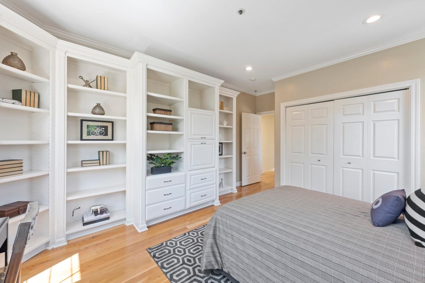 131 Giffin Road Los Altos, CA 94022 - Photo 14 of 29 a bedroom with a bed and a cabinets