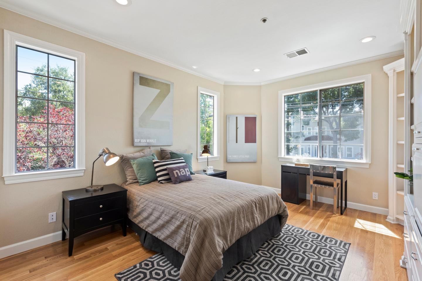 131 Giffin Road Los Altos, CA 94022 - Photo 15 of 29 a bedroom with a bed and wooden floor