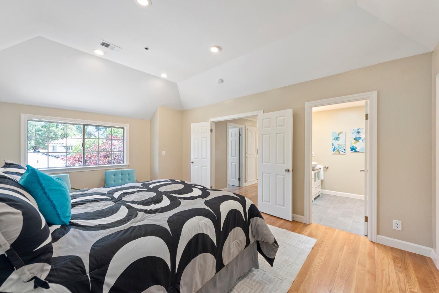 131 Giffin Road Los Altos, CA 94022 - Photo 20 of 29 a bedroom with a bed and a dresser