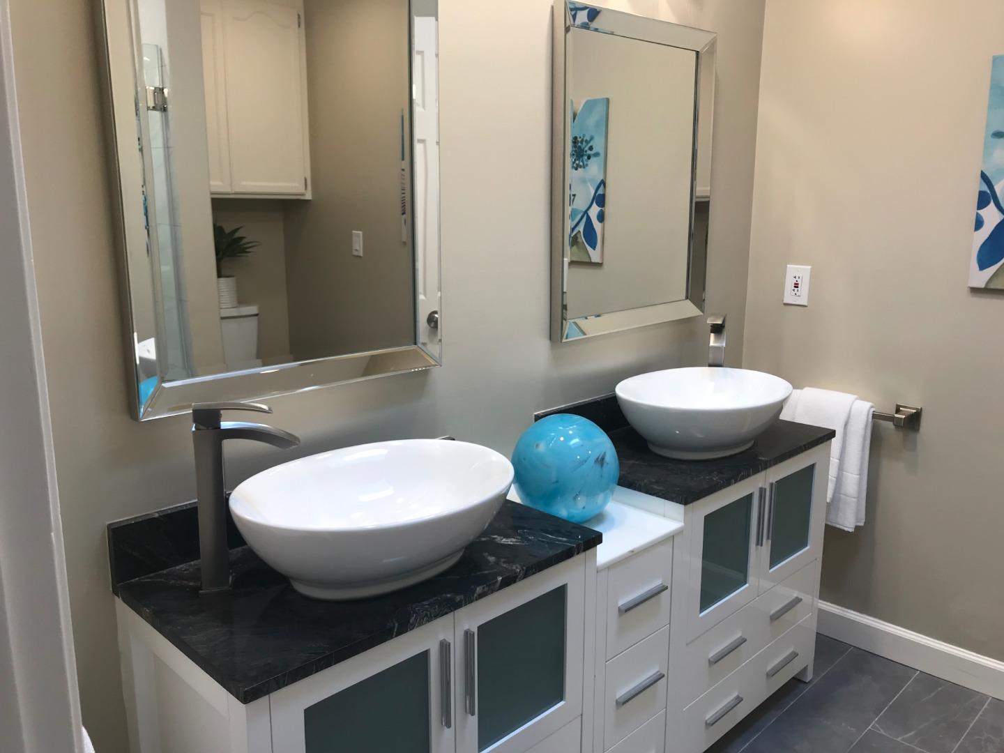 131 Giffin Road Los Altos, CA 94022 - Photo 21 of 29 a bathroom with a sink and a mirror