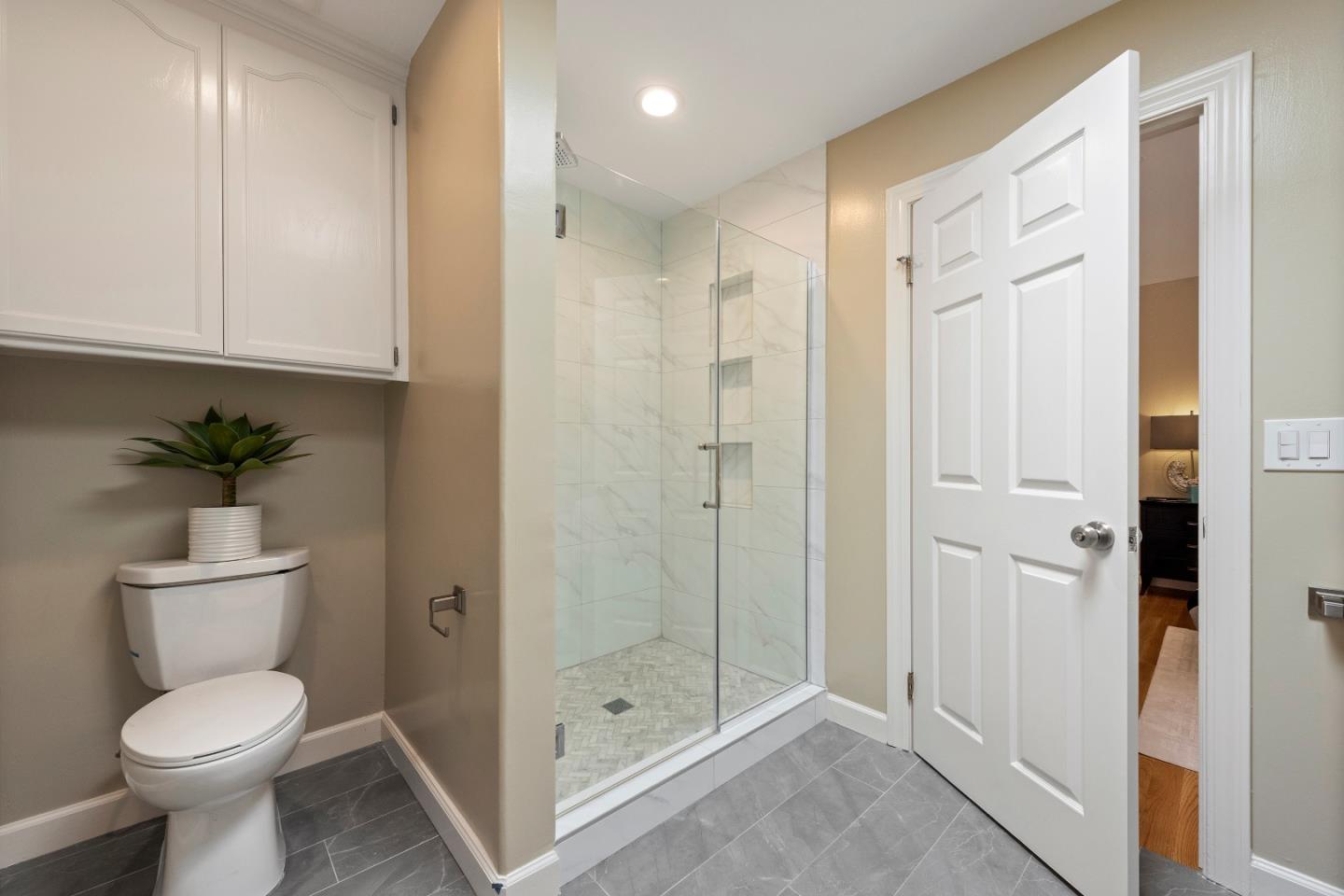 131 Giffin Road Los Altos, CA 94022 - Photo 22 of 29 a bathroom with a shower and a toilet