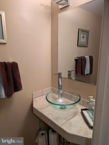 a dining room with table and couch