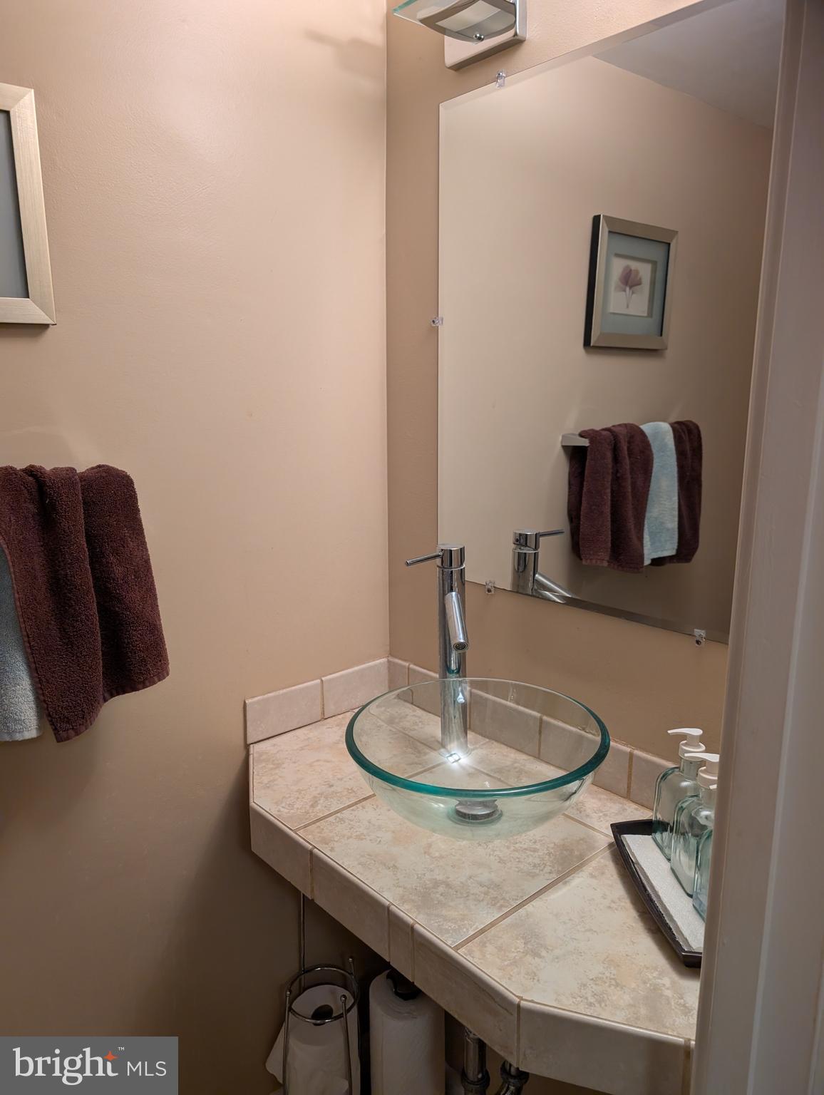 5451 Fallriver Row Court Columbia, MD 21044 - Photo 11 of 11 a dining room with table and couch